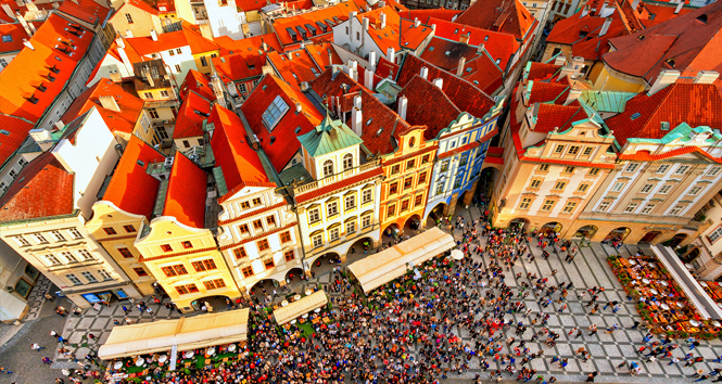 Houses with traditional red roofs in Prague. Old Town Square in the Czech Republic.